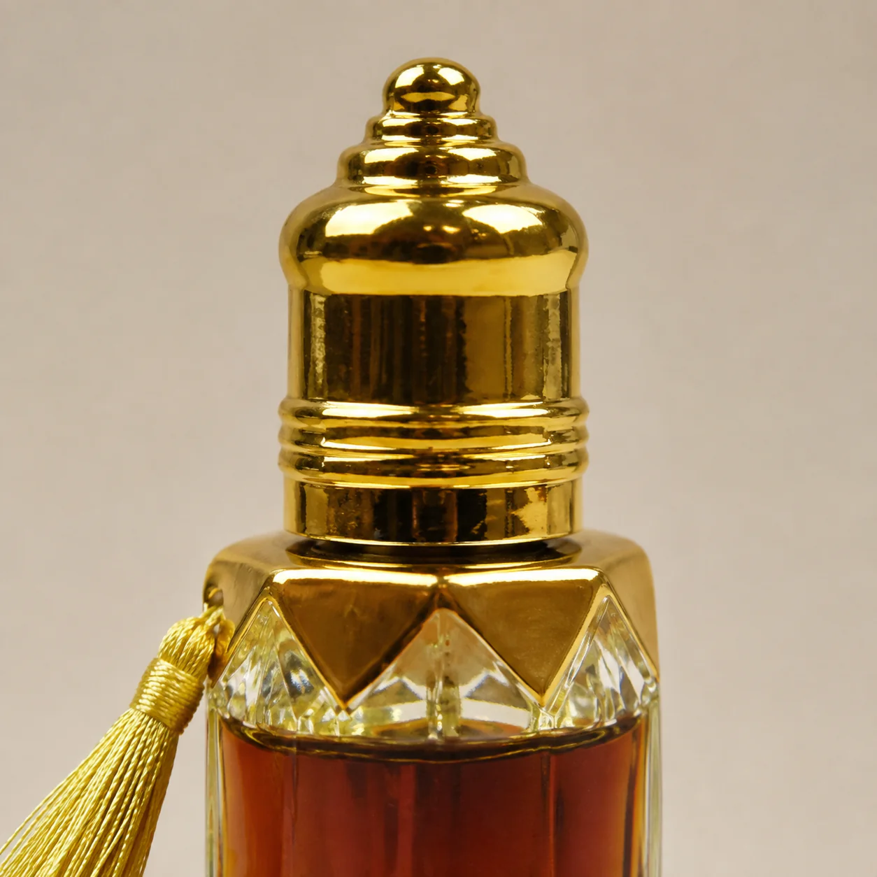 Kyara-style agarwood essential oil gold cap detail