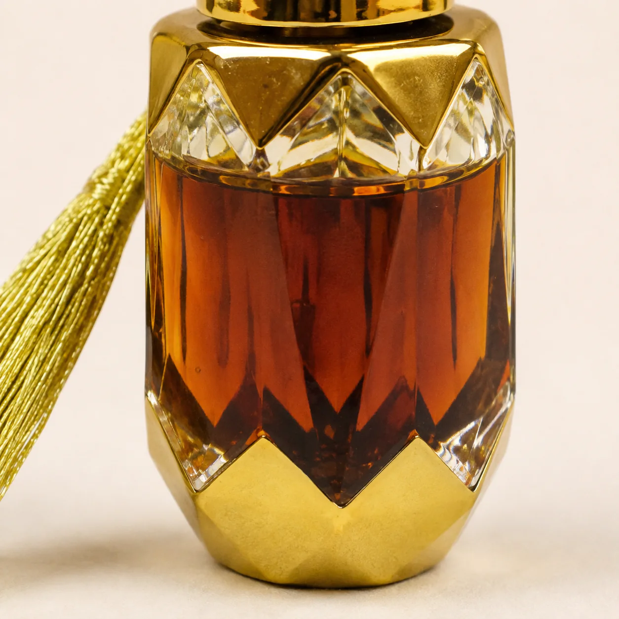 Kyara-style agarwood essential oil faceted bottle detail