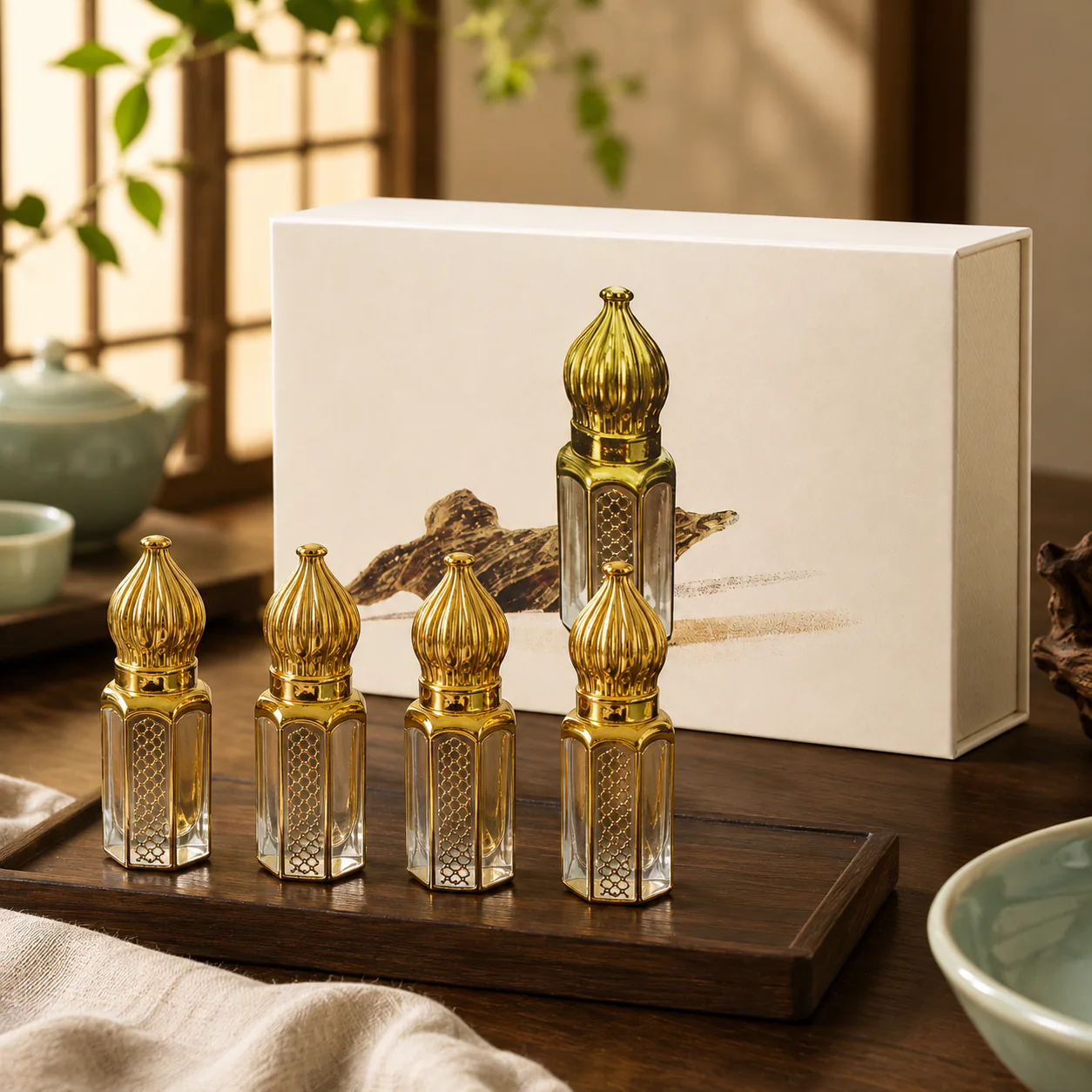 Agarwood fragrance oil set of four in a refined setting