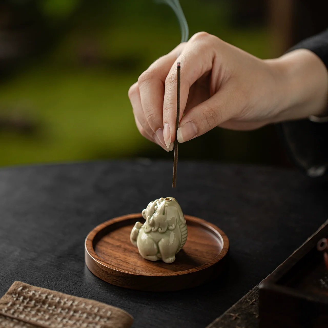 Celadon Guardian Beast Incense Holder during incense placement