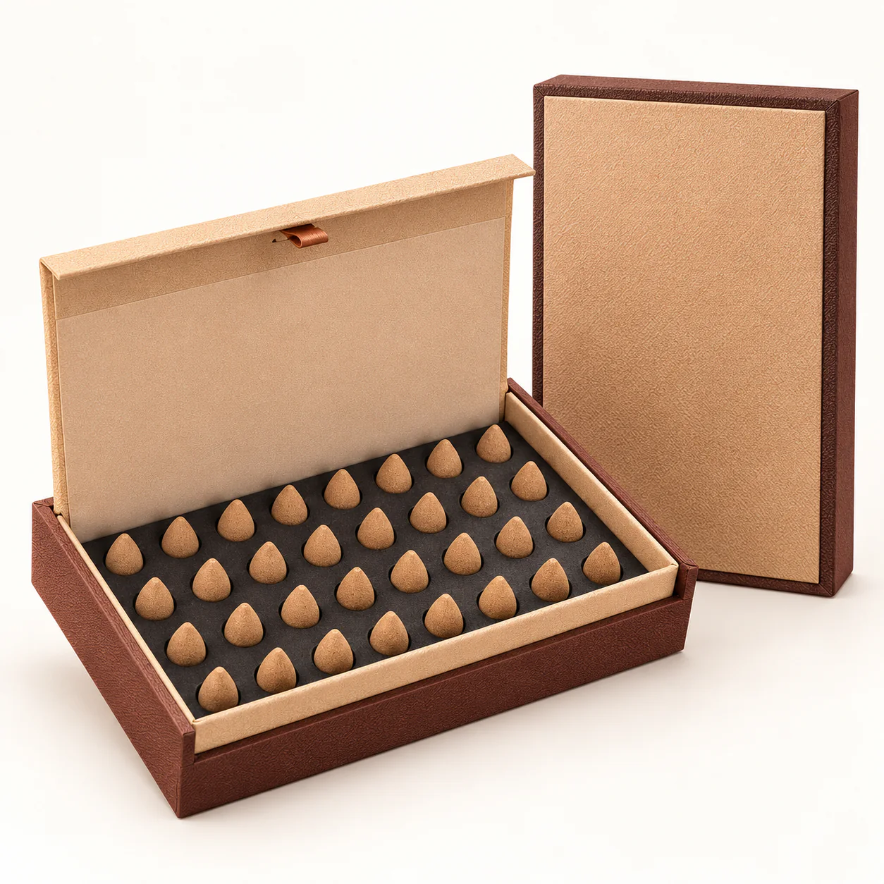 Natural aromatic cone incense on a clean warm-white background