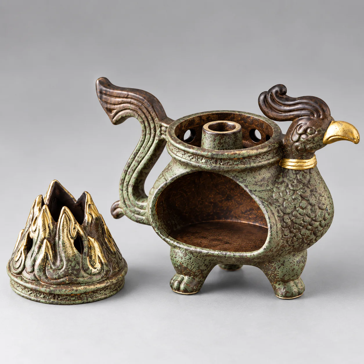 Sun Bird Bronze-Glaze Incense Burner showing removable flame crown and incense chamber