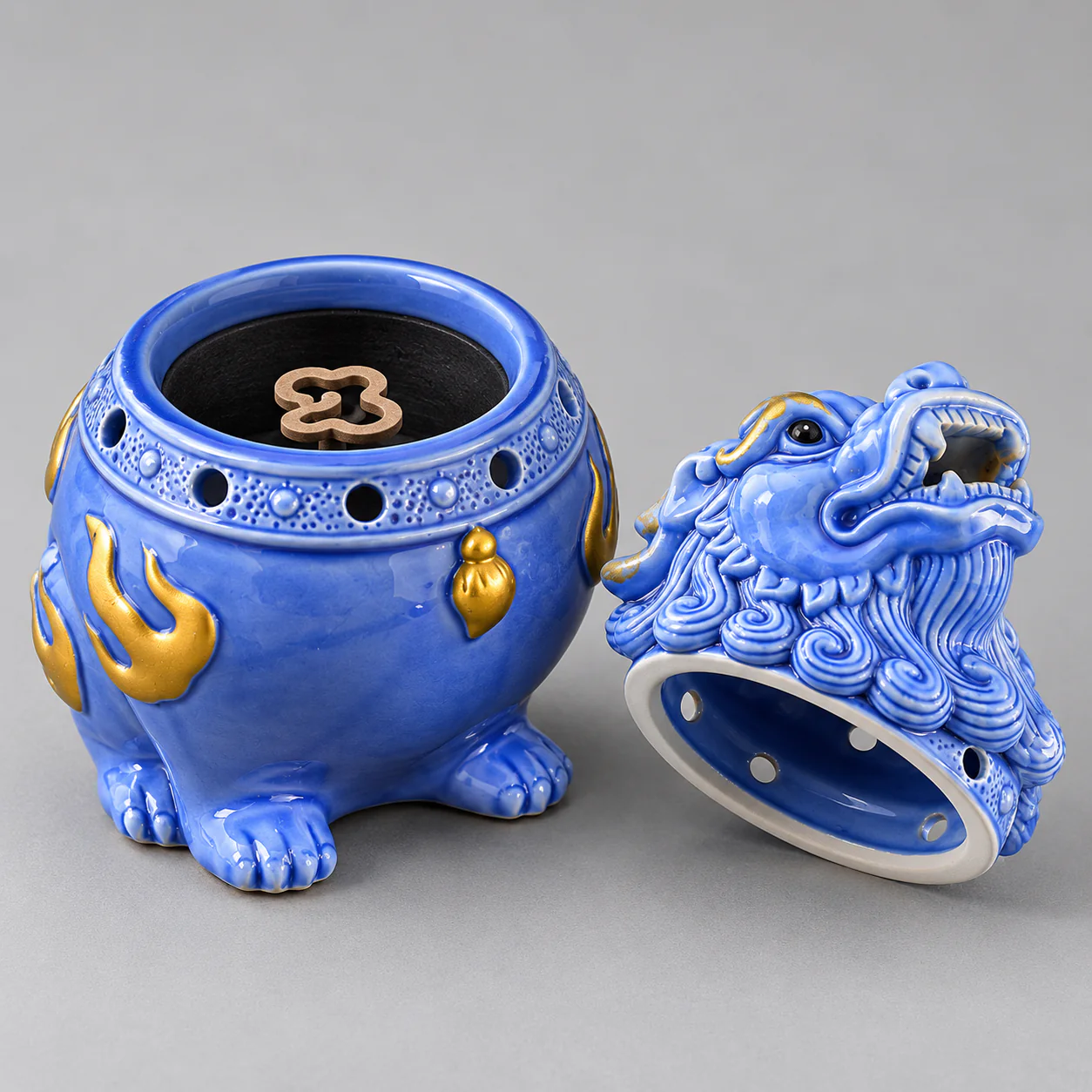 Celestial Guardian Ceramic Coil Incense Burner showing inner chamber and vent holes