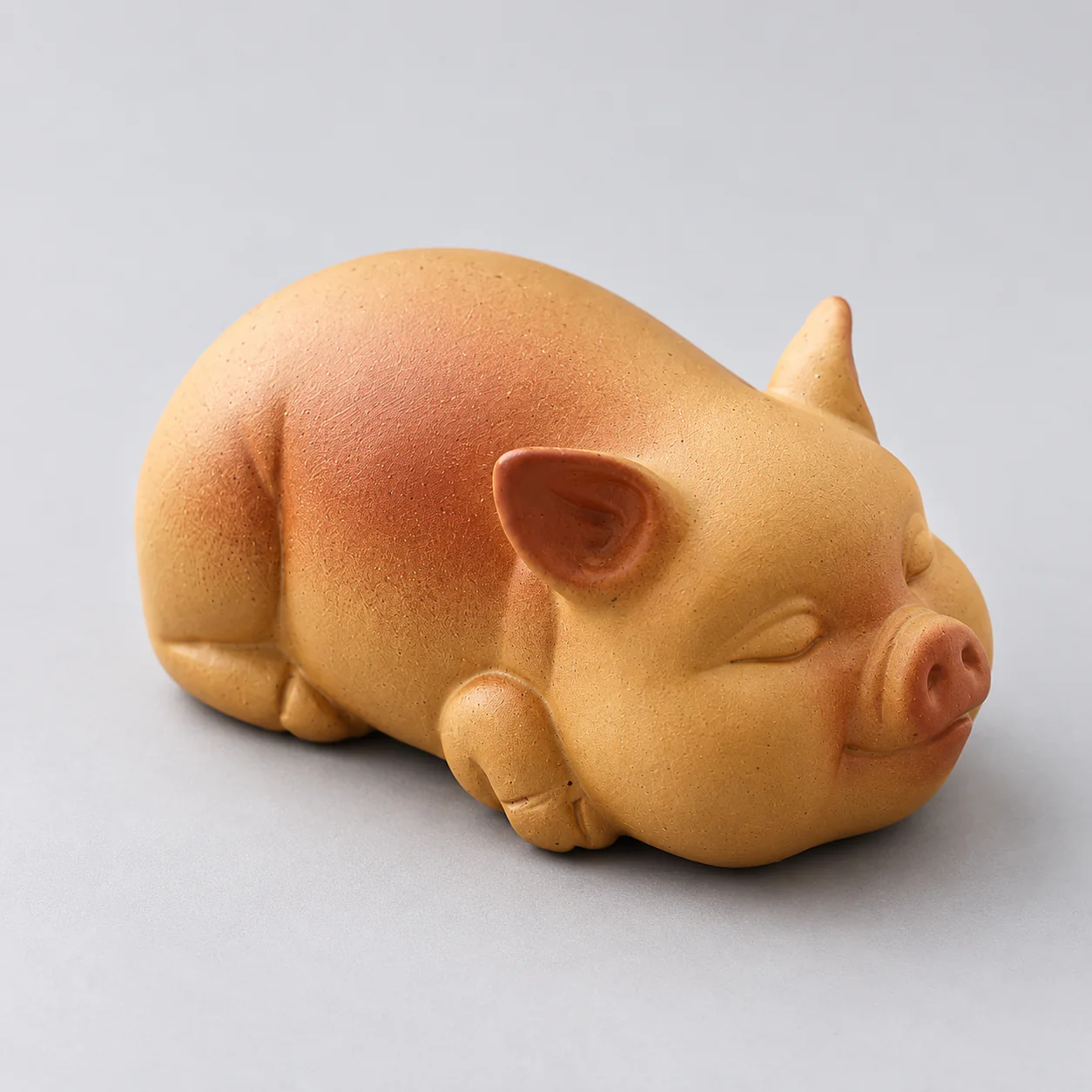 Handcrafted Purple Clay Pig Tea Ornament from an alternate angle