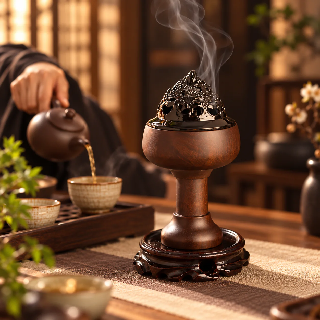 Ebony Cloud-Motif Incense Burner in use during a tea ceremony
