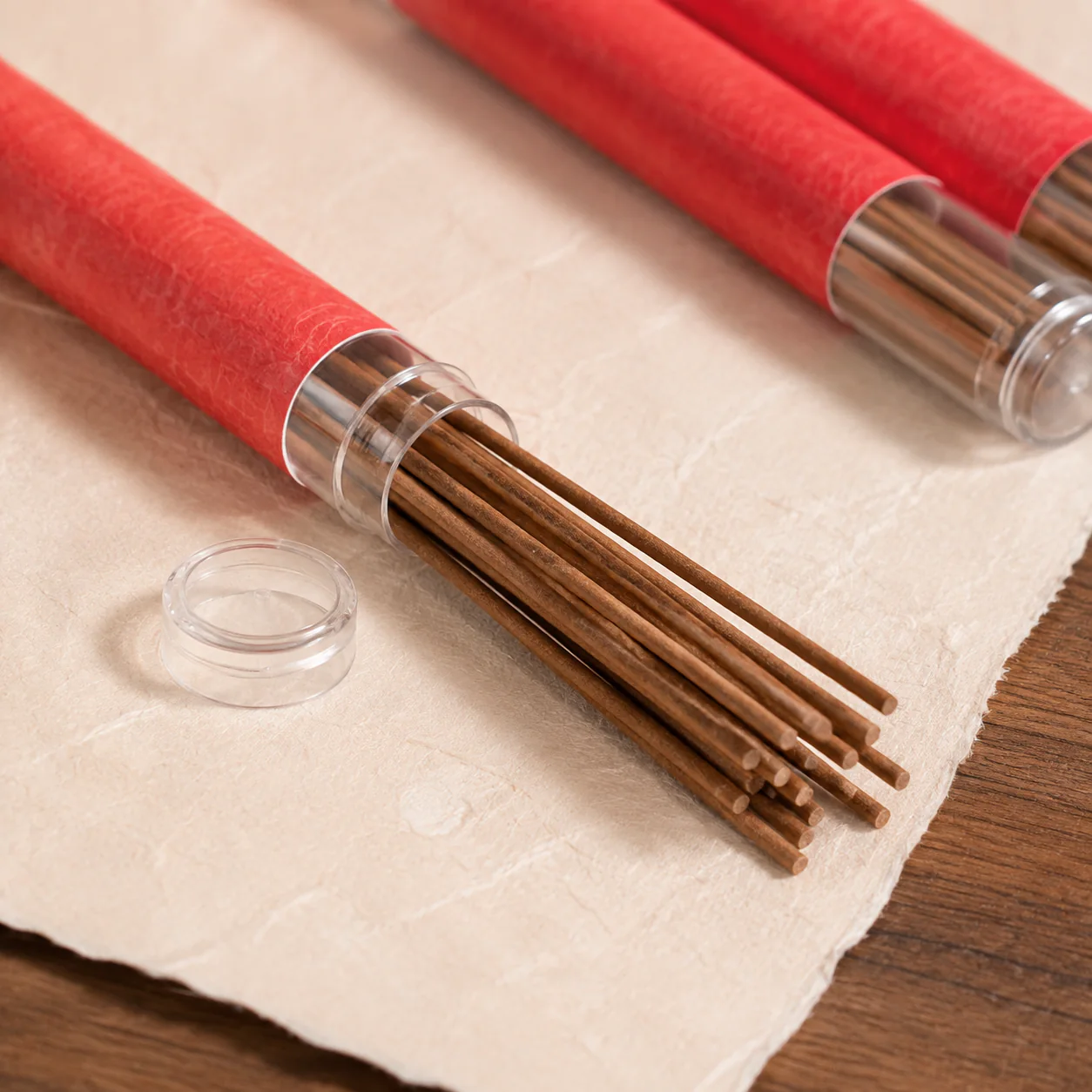 Agarwood incense tube opening and stick detail