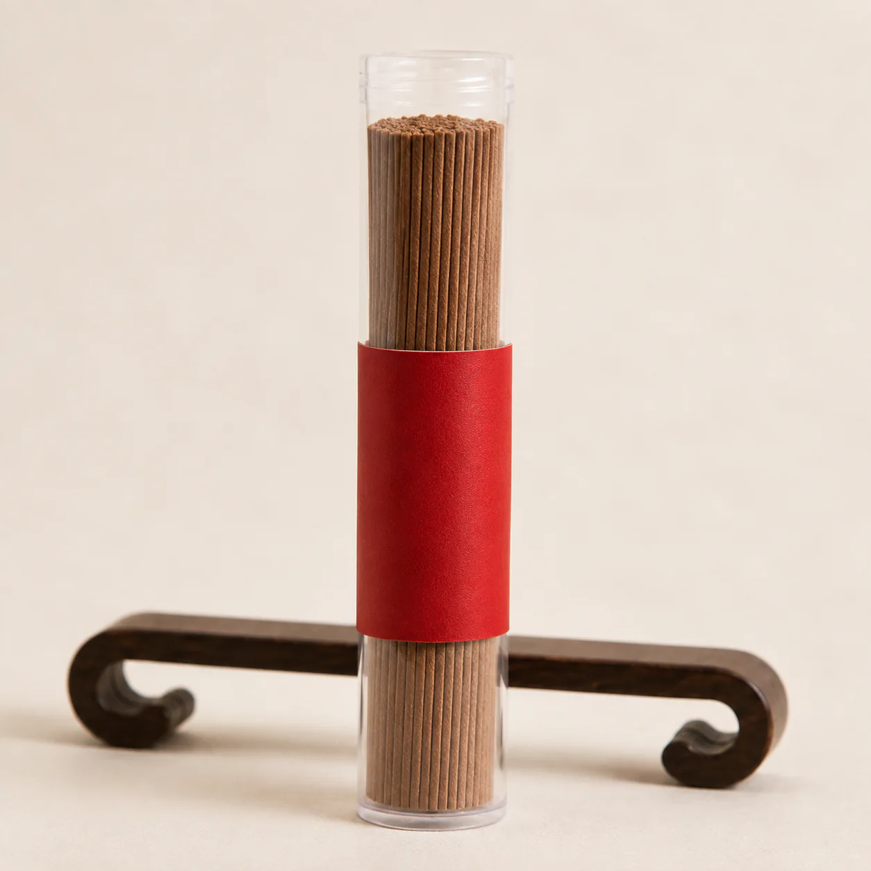 Hainan agarwood incense sticks in a clear tube