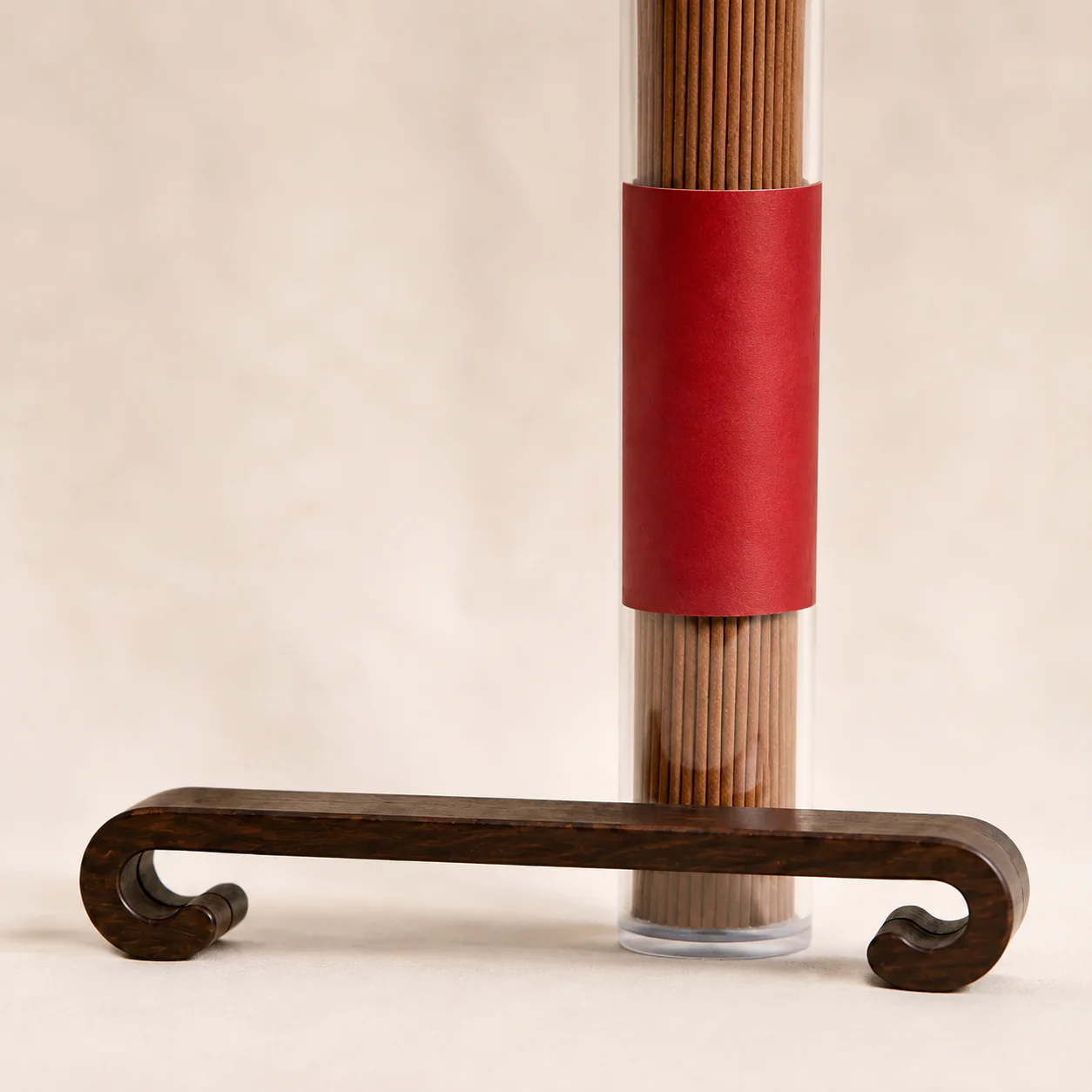 Dark walnut dragon tray and incense tube detail