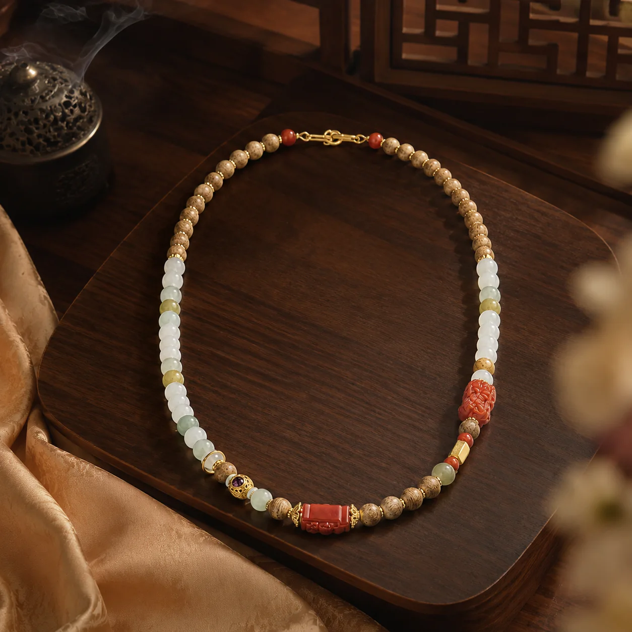 Agarwood and pale jade bead necklace in a refined setting