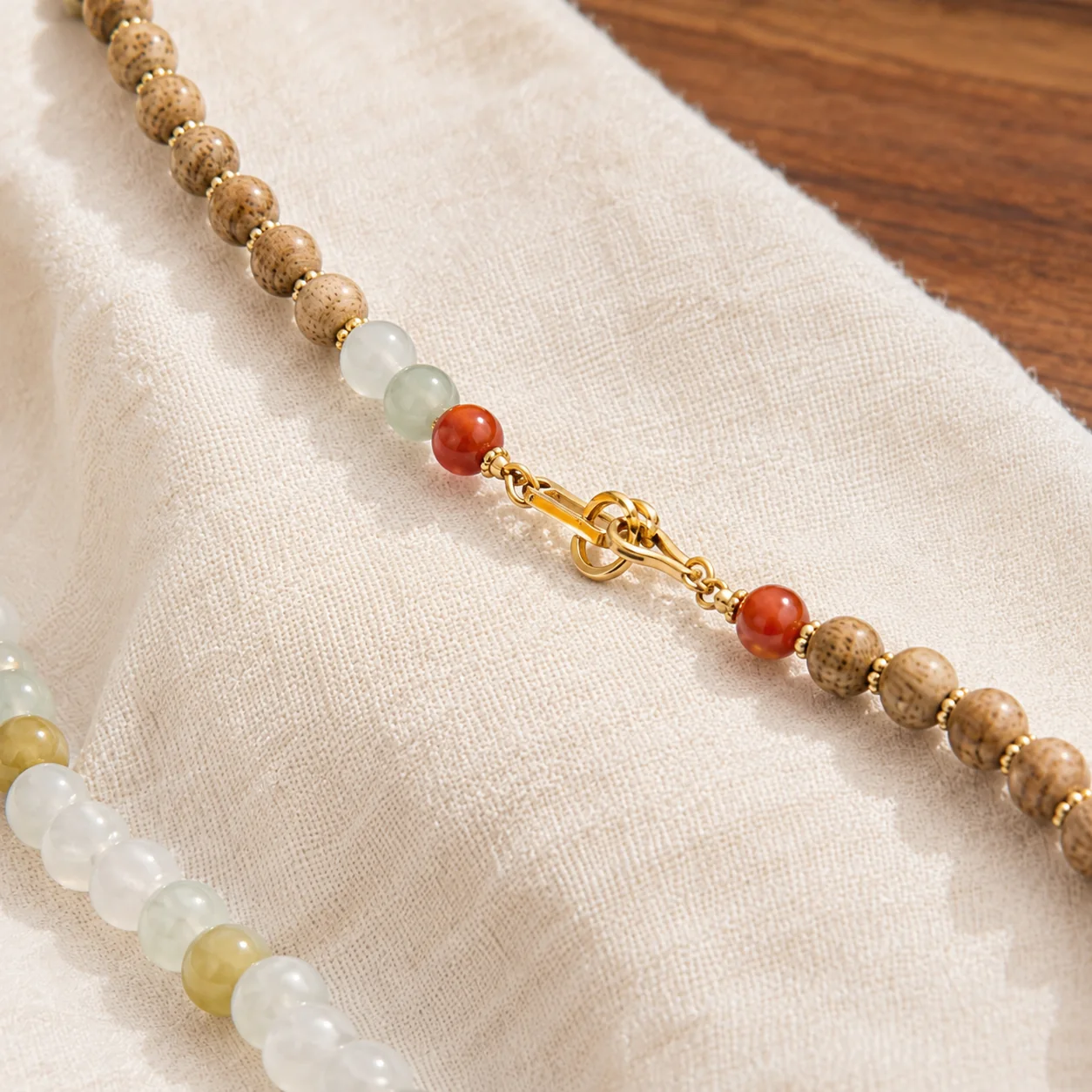Gold clasp and natural bead detail