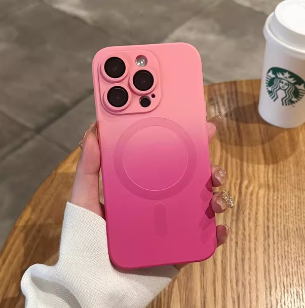 Hand holding hot pink iPhone case with MagSafe ring, real-life view of slim fit protective cover