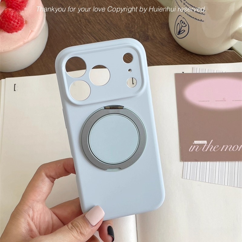 Light blue MagSafe magnetic ring iPhone case shown in hand, matte protective cover