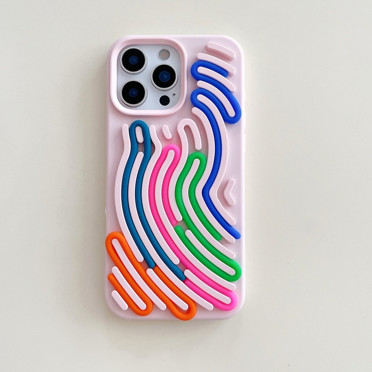 White iPhone case close-up with neon rainbow wave lines, slim protective case