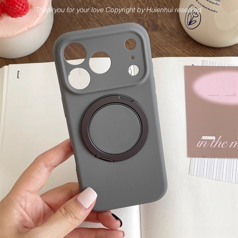 Gray MagSafe magnetic ring iPhone case shown in hand, matte protective cover