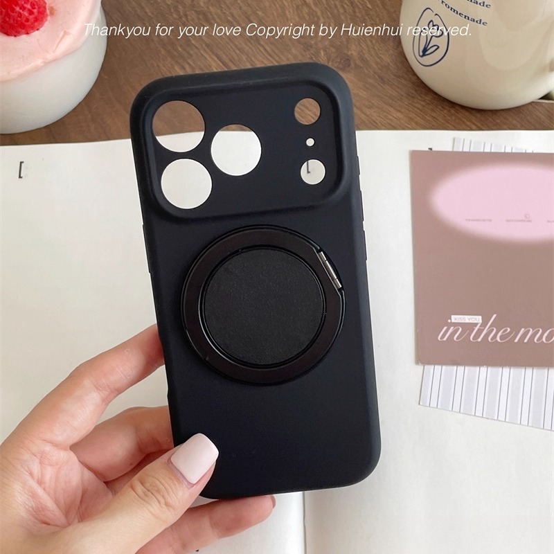 Black MagSafe magnetic ring iPhone case shown in hand, slim protective cover