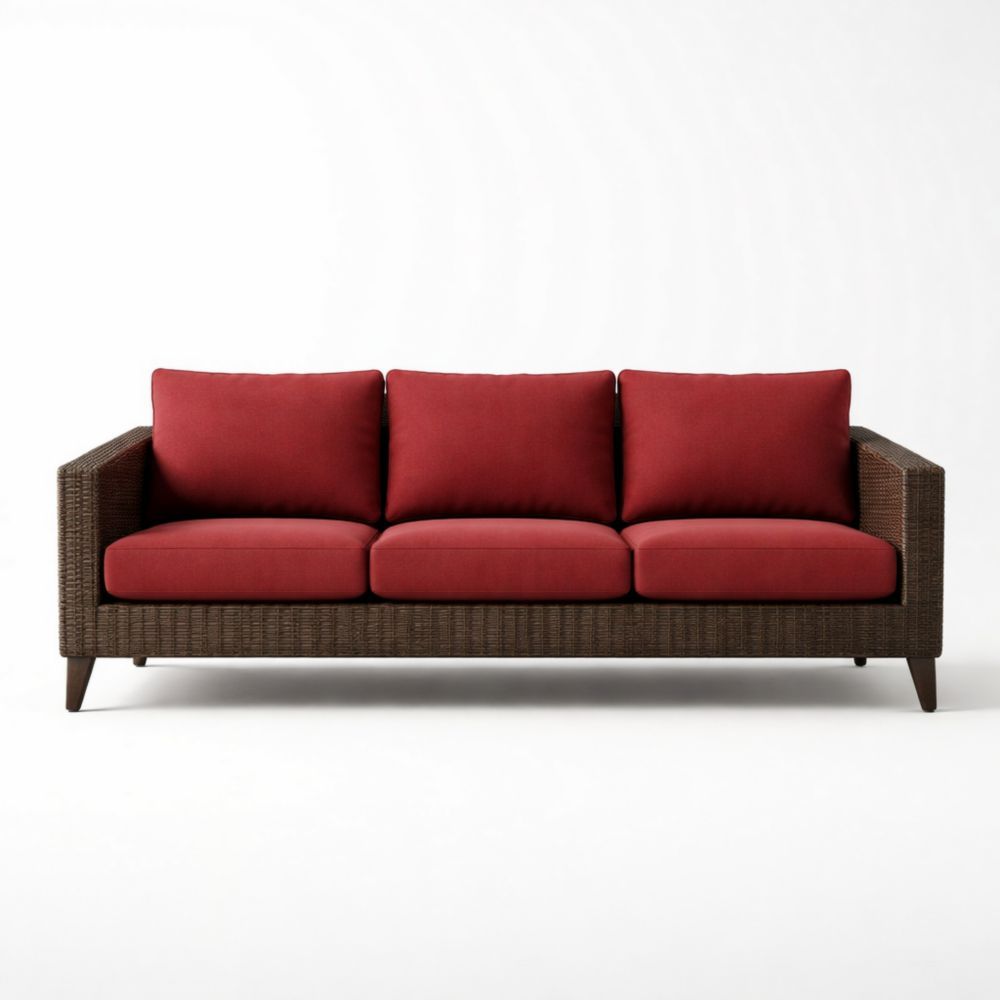Divano a tre posti in rattan con cuscini rossi