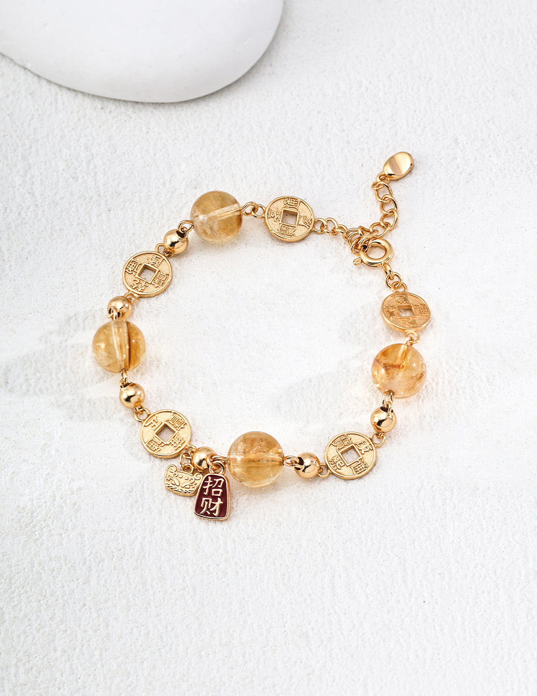 S925 sterling silver bracelet with citrine, crystal, and tiger's eye stones (believed to bring good fortune).