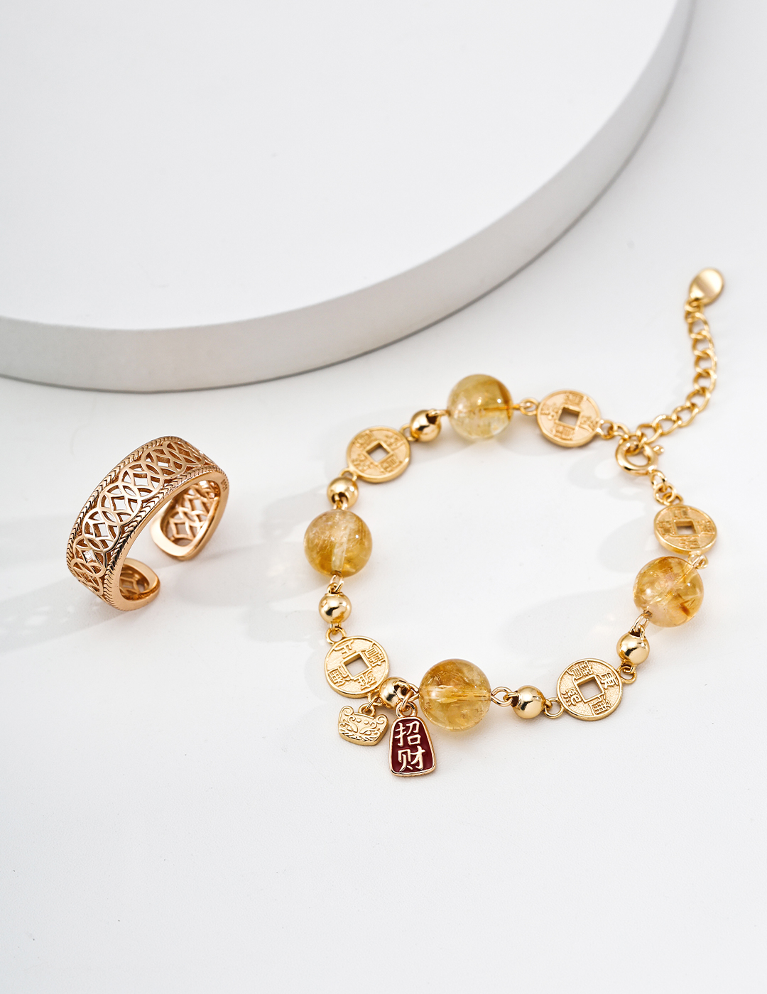 S925 sterling silver bracelet with citrine, crystal, and tiger's eye stones (believed to bring good fortune).