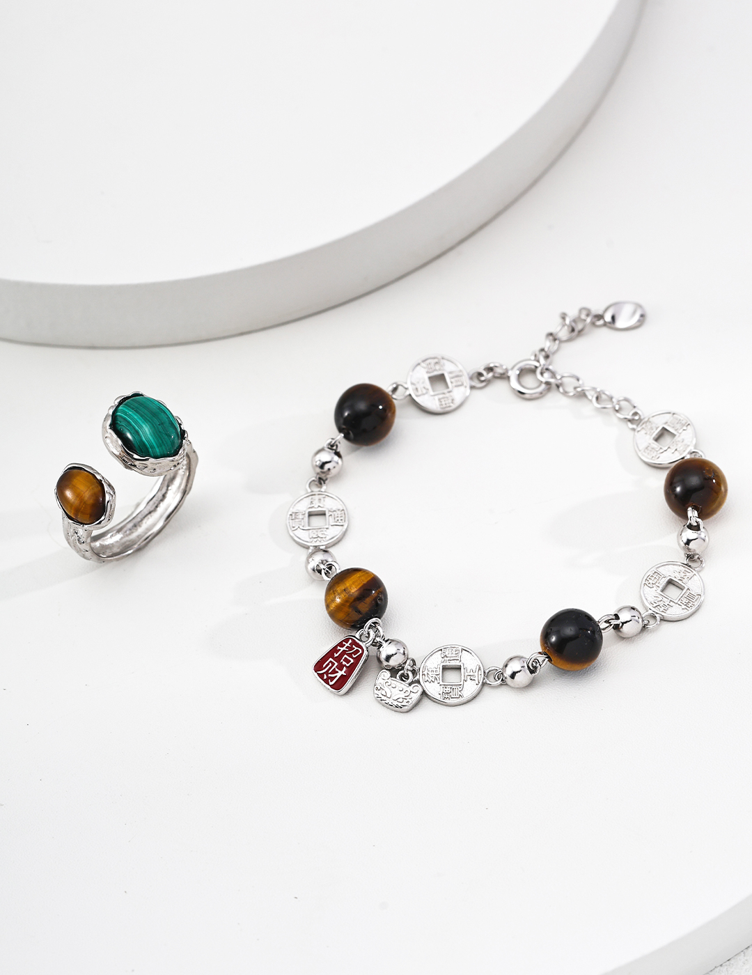 S925 sterling silver bracelet with citrine, crystal, and tiger's eye stones (believed to bring good fortune).