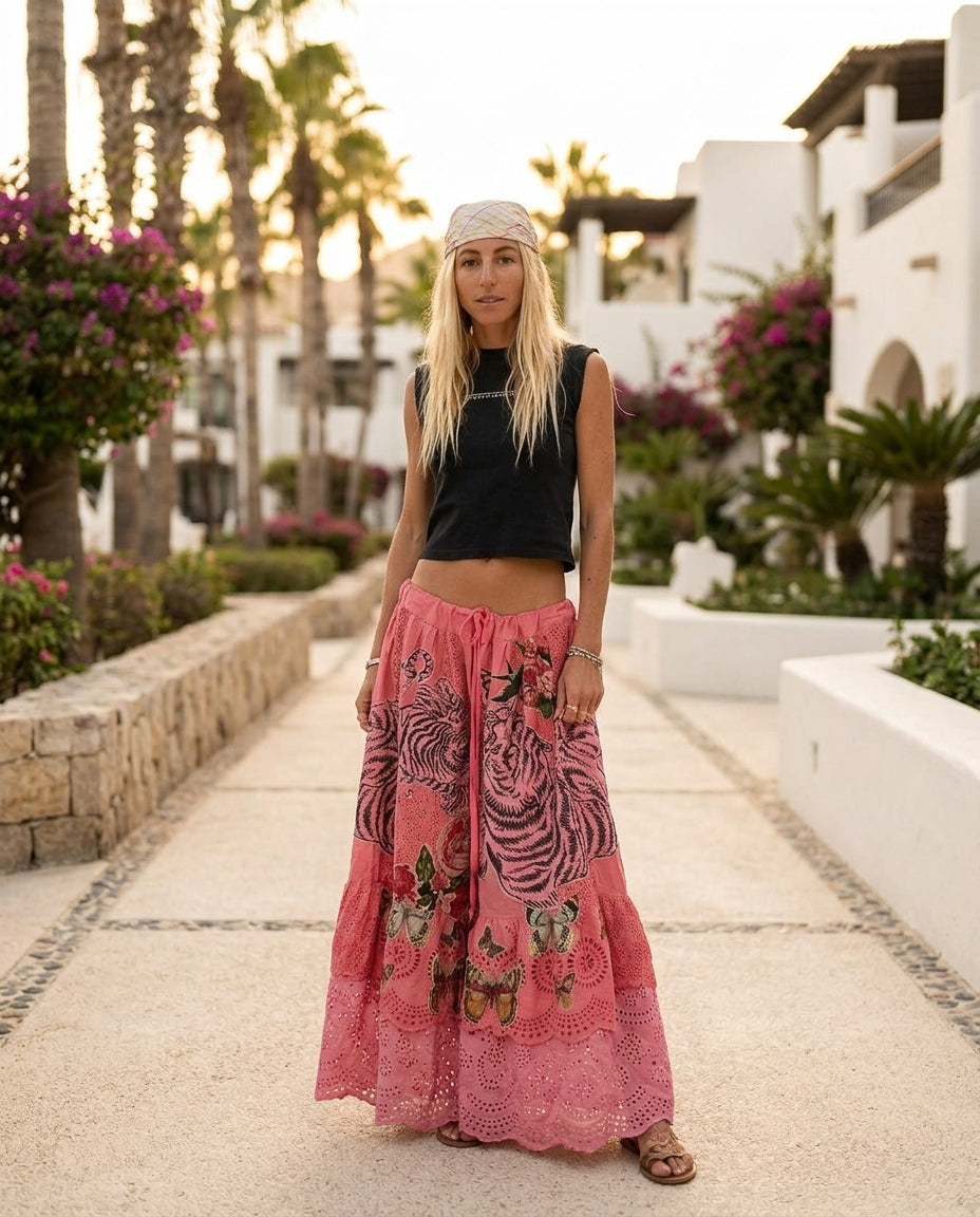 Pink Gleam Resort Eyelet Pants Pink Pants with Asymmetric silhouette and Textured texture, lifestyle scene image for Resort Wear, Evening in Amalfi, Euro Chic Premium by Mesadic