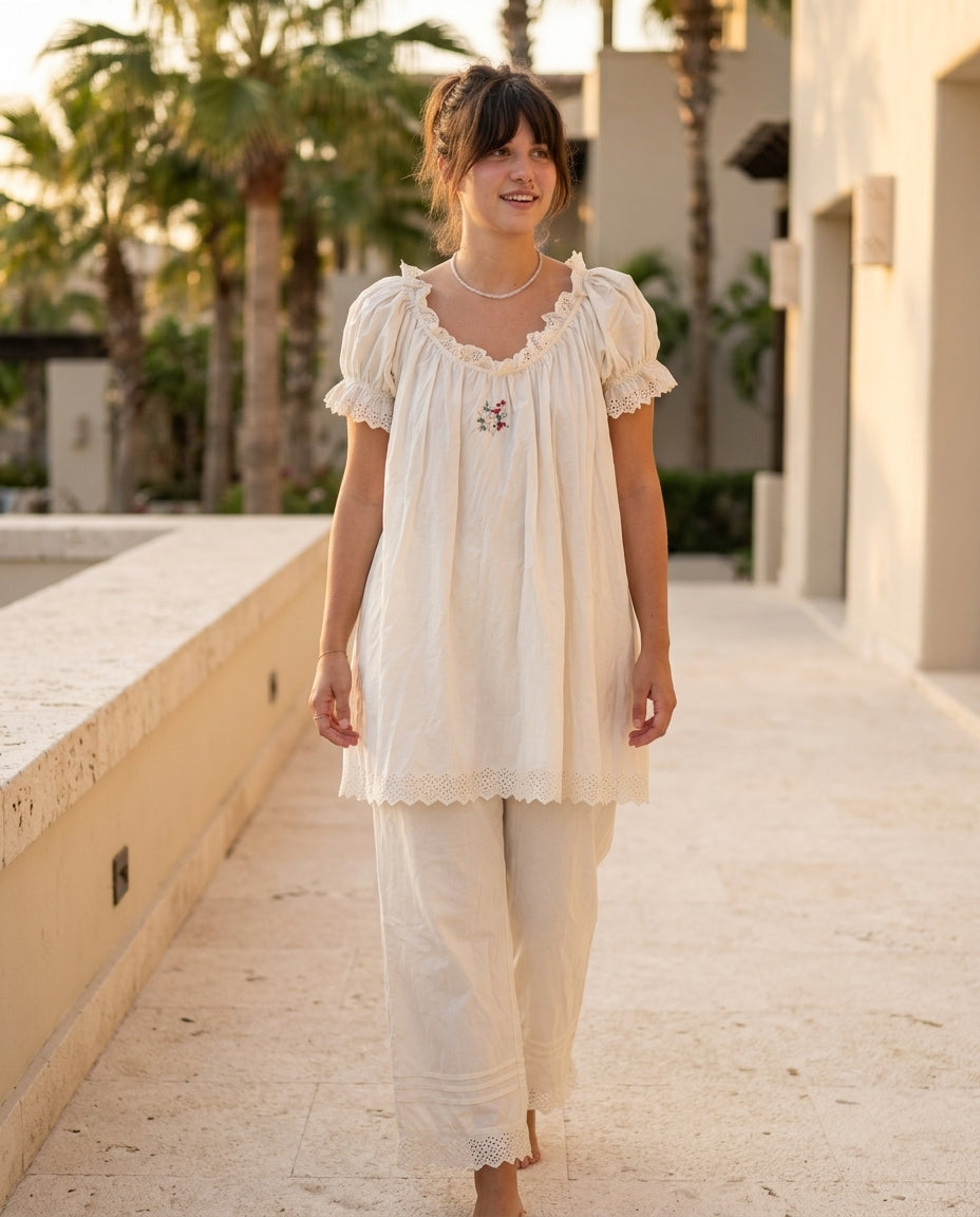 Ivory Allure Lounge Eyelet Pant Set Ivory Pant Set with Wide-Leg silhouette and Textured texture, outdoor styling image for Resort Brunch, an estate dinner at golden hour, US East / Hamptons Elite by ads.floravincie