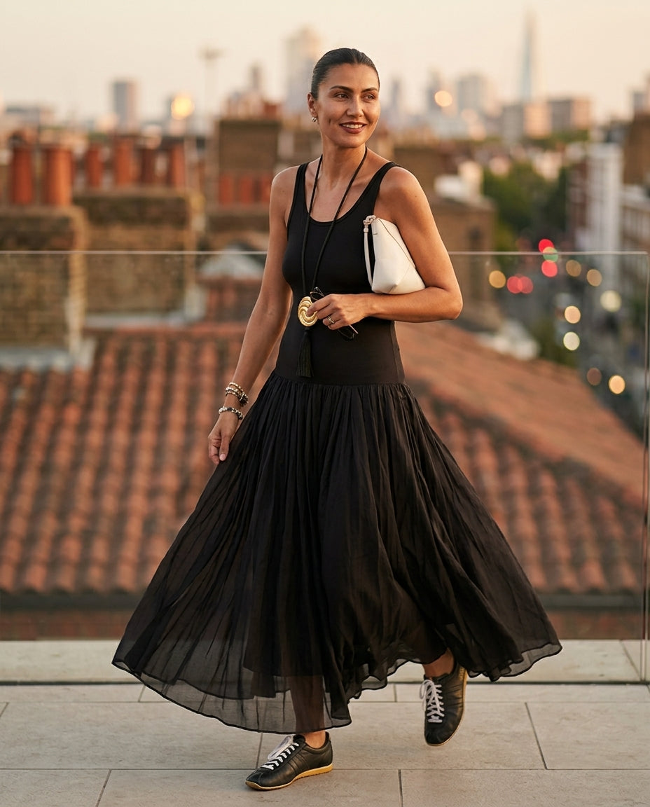 Black Charm Summer Textured Maxi Dress Black Maxi Dress with Relaxed Fit silhouette and Ribbed Knit texture, outdoor styling image for Garden Party, an estate dinner at golden hour, US East / Hamptons Elite by Mesadic