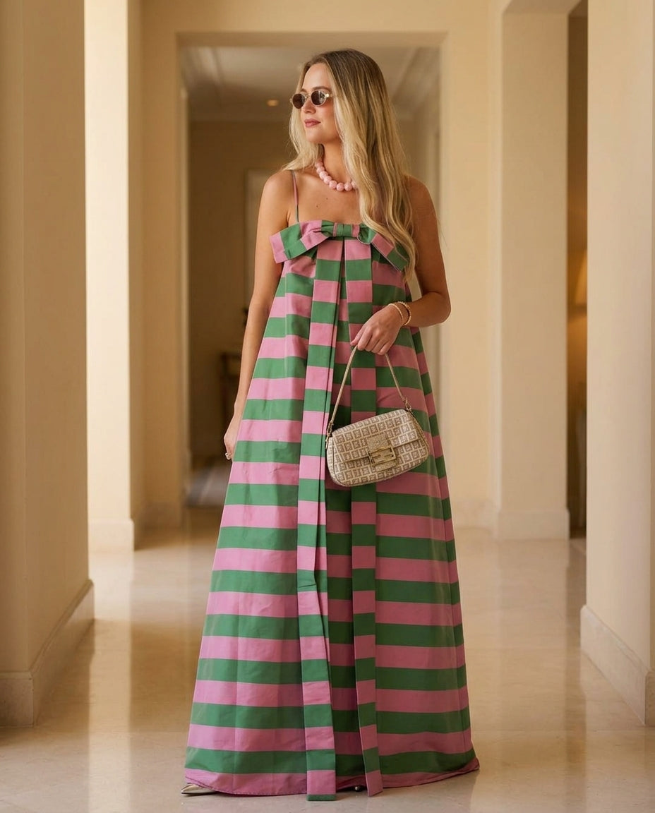 Pink Grace Resort Striped Romper Pink Romper with Relaxed Fit silhouette and Poplin texture, editorial ecommerce scene for Resort Wear, a rooftop dinner in LA, US Coastal Glam by ads.floravincie