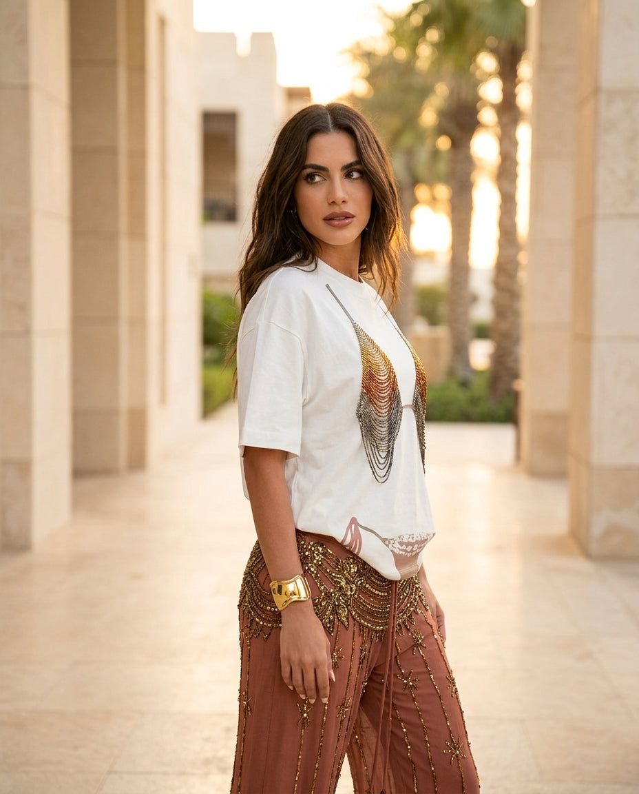 Ivory Eyelet V-Neck Short Set "Margot" Ivory Short Set with Relaxed Fit silhouette and Textured texture, lifestyle scene image for Vacation Set, a gallery opening in Paris, Euro Chic Premium