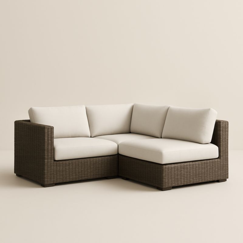 Canapé d'angle en rotin synthétique marron avec coussins beige