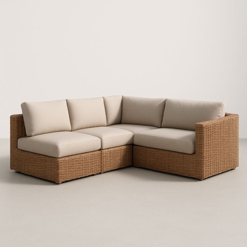 Canapé d'angle modulaire en résine tressée et coussins polyester beige