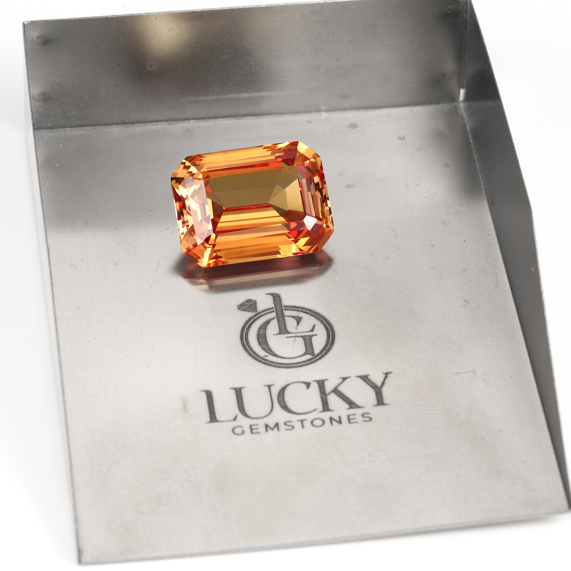 18CT Emerald Cut Lab Grown London Orange Sapphire