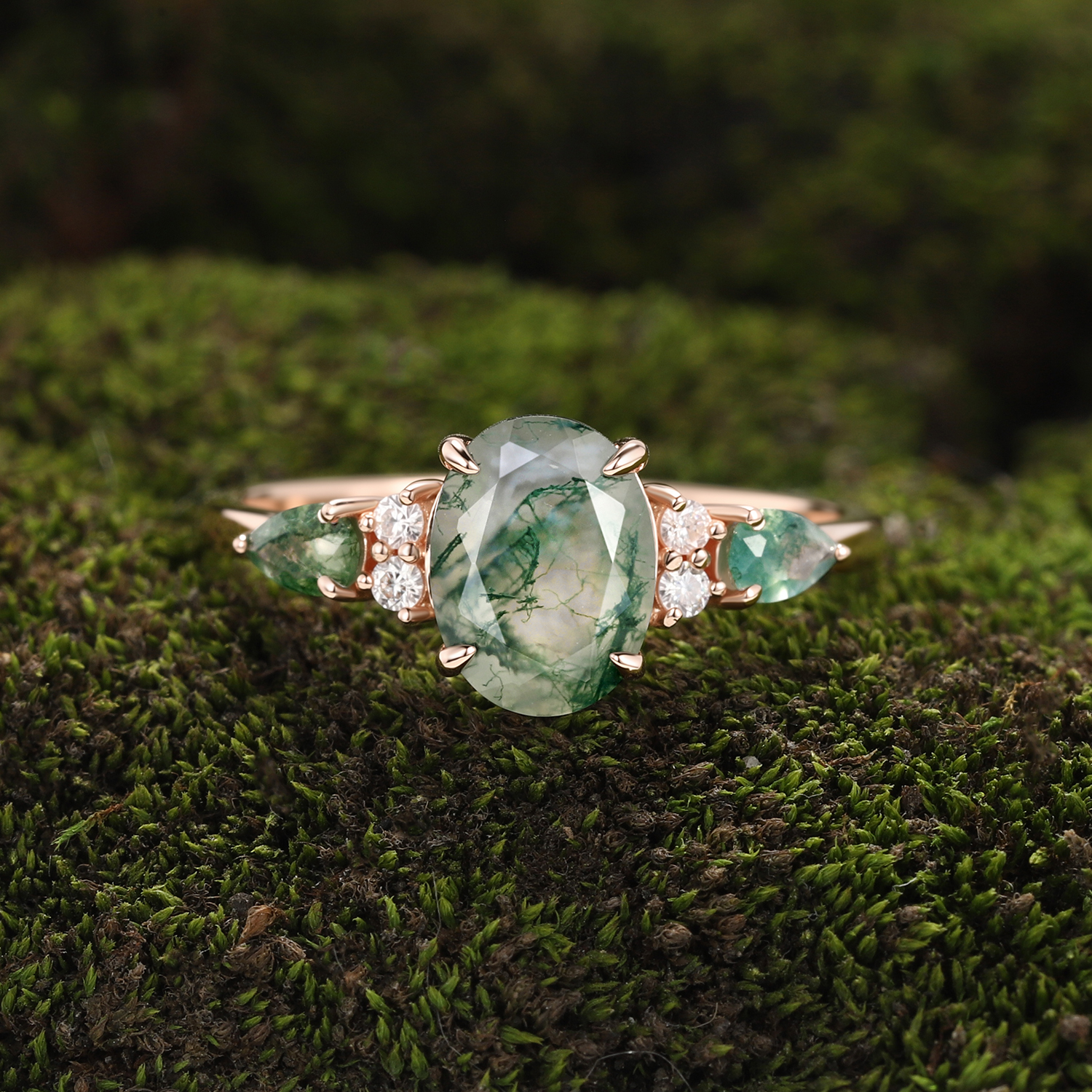 Rose Gold Natural Oval Cut Moss Agate Three-Stone Ring with Pear Side Stones & Moissanite Accents | Nature-Inspired Engagement Ring