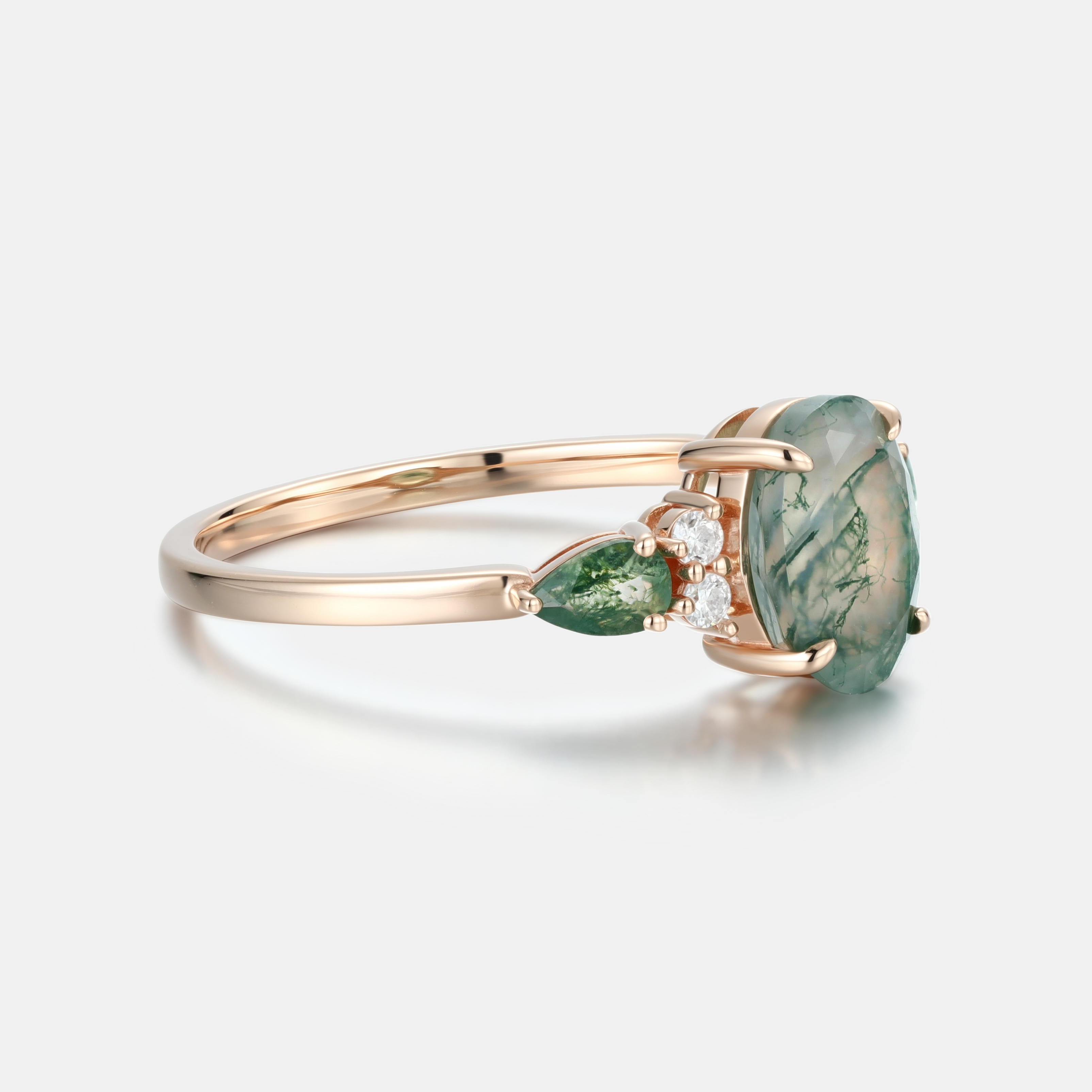 Rose Gold Natural Oval Cut Moss Agate Three-Stone Ring with Pear Side Stones & Moissanite Accents | Nature-Inspired Engagement Ring