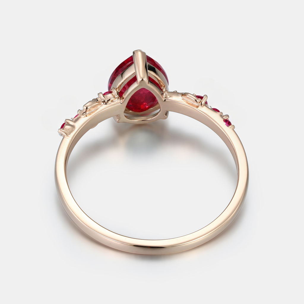 Lucky Pear Ruby Engagement Ring in 14K Rose Gold | Leaf Vine Botanical Design with Ruby Accents