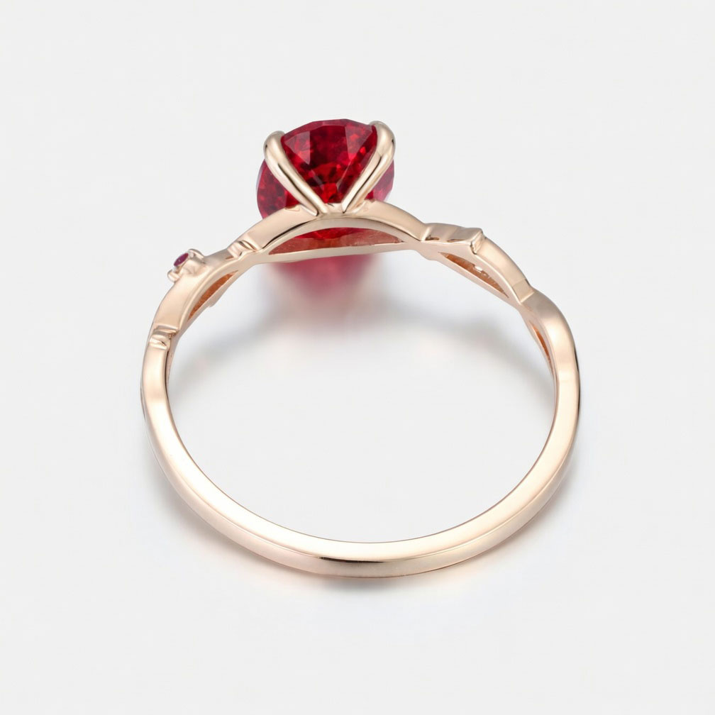 Lucky Oval Lab Grown Ruby Engagement Ring in Rose Gold | Intricate Leaf Vine Botanical Design with Ruby Accents