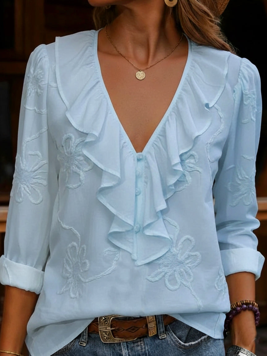 ruffled V-neck shirt with embroidered flowers