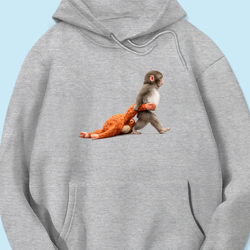 Baby Monkey Punch Graphic T-Shirt Baby Monkey Holding Plush Toy