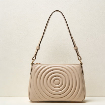 Okrągła pikowana torebka na ramię