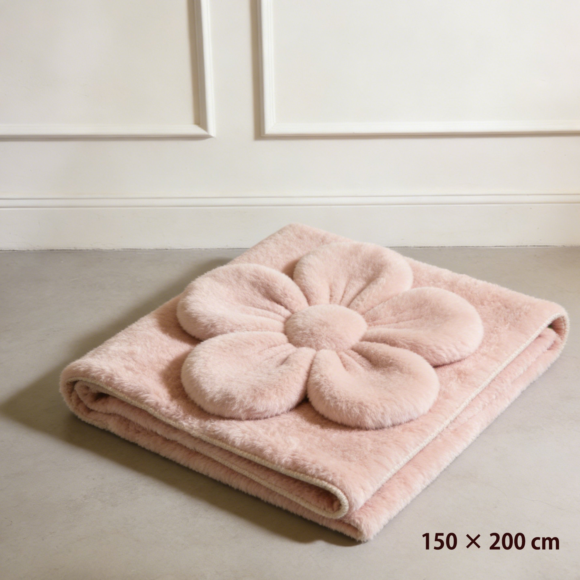 Detal pluszowego koca w formie płatków kwiatu