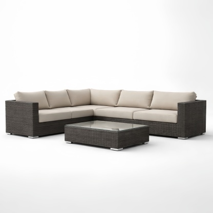 Divano angolare da esterno in rattan con tavolino in vetro temperato