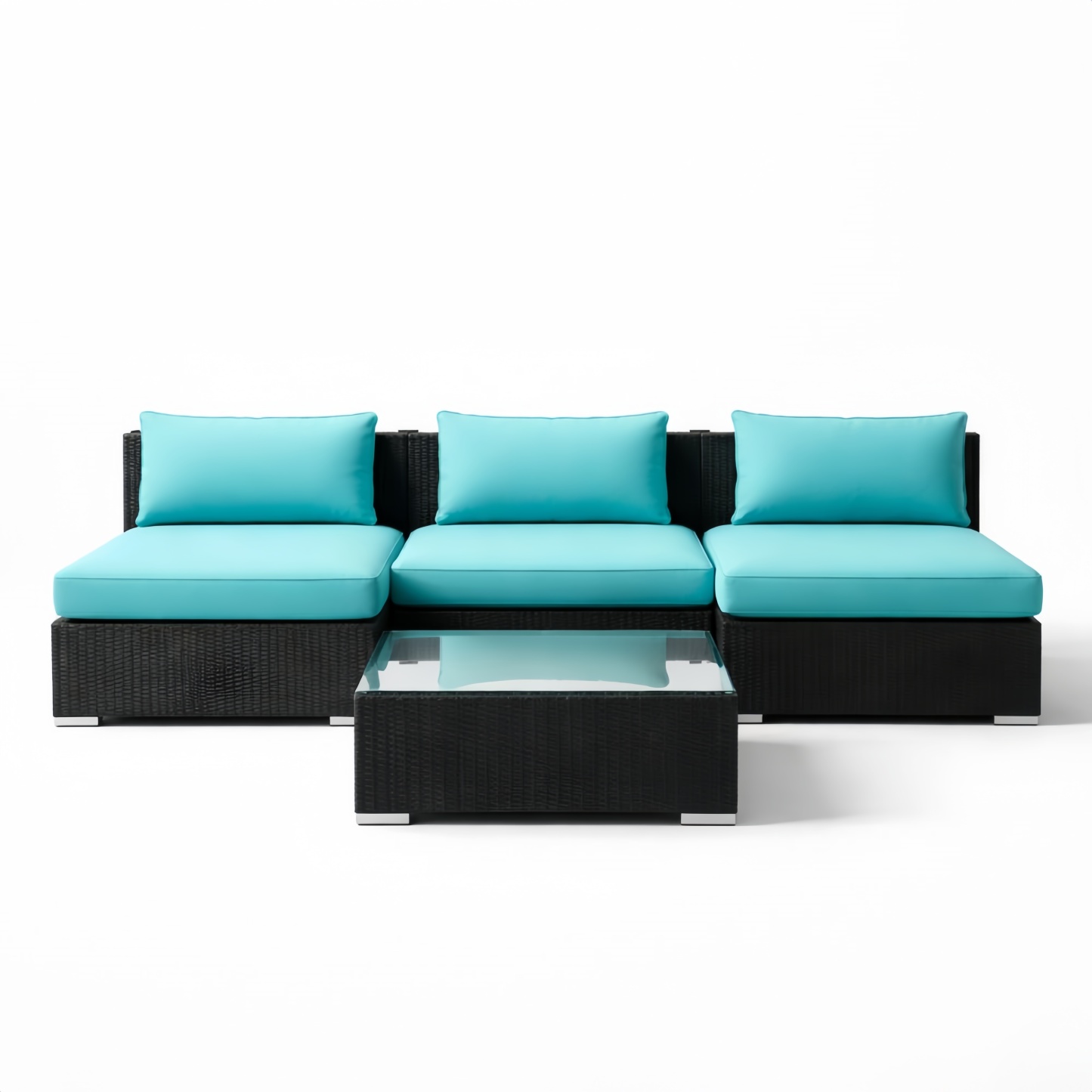 Divano modulare in rattan con cuscini turchesi e tavolo in vetro temperato