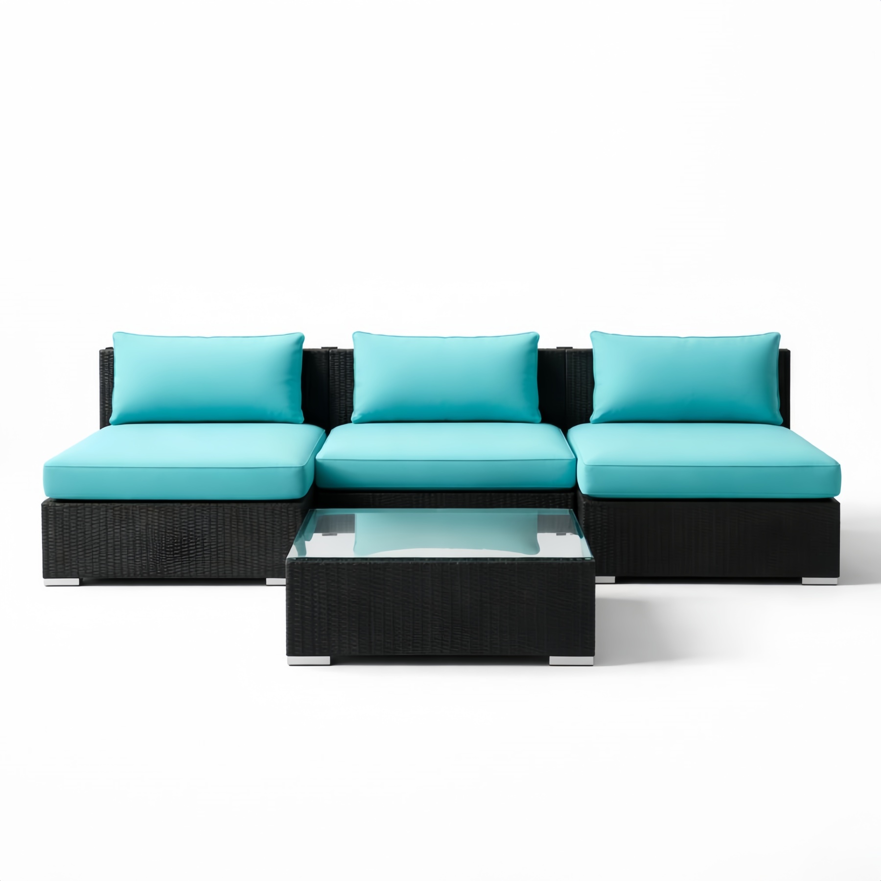 Divano modulare in rattan con cuscini turchesi e tavolo in vetro temperato