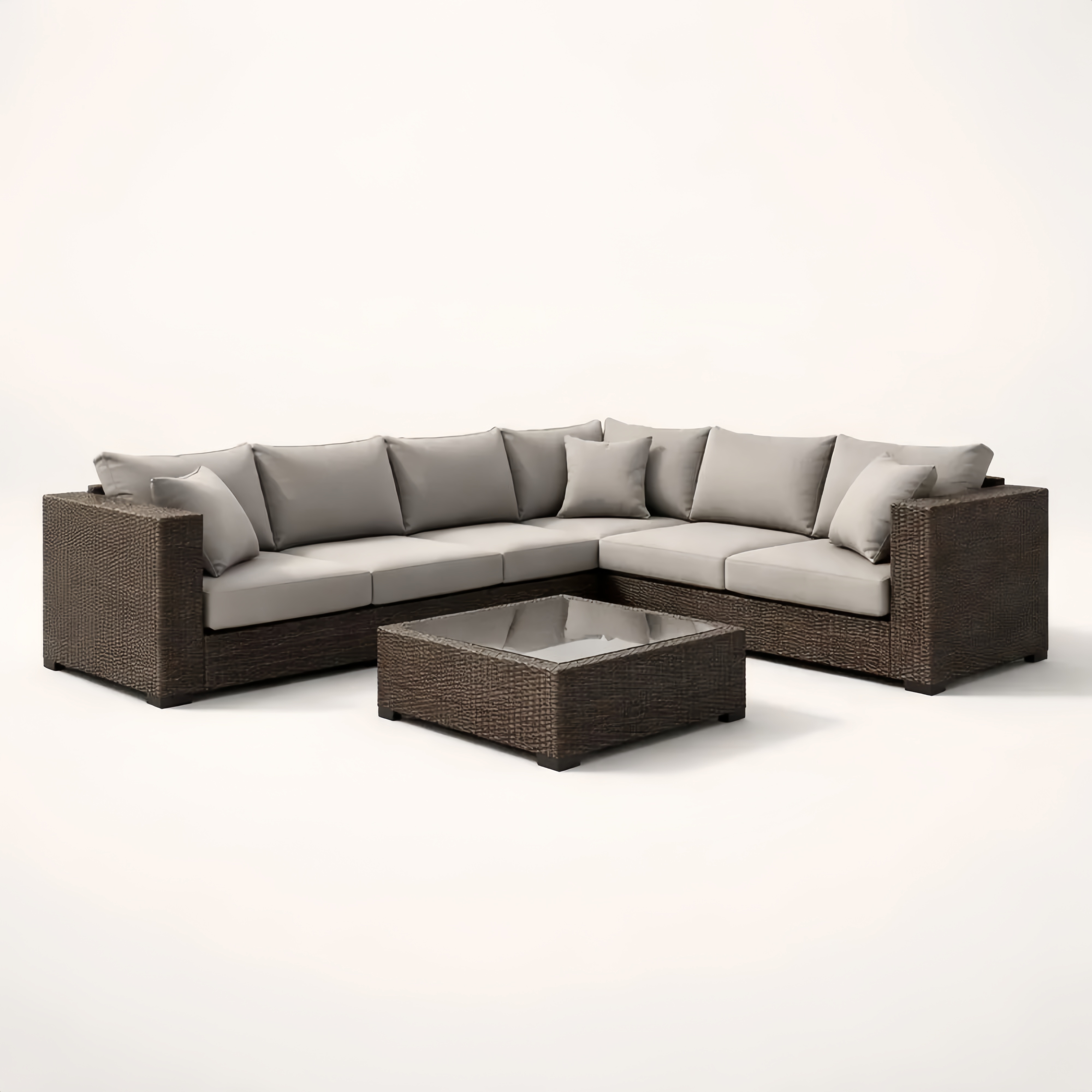 Divano Angolare da Giardino in Rattan con Cuscini Grigio e Tavolino in Vetro