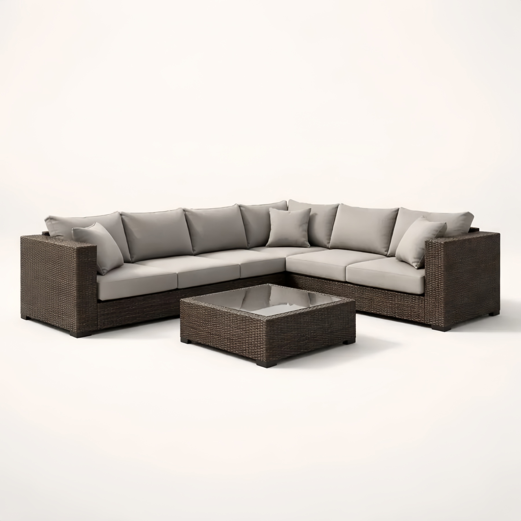 Divano Angolare da Giardino in Rattan con Cuscini Grigio e Tavolino in Vetro