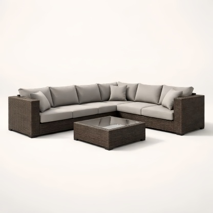 Divano Angolare da Giardino in Rattan con Cuscini Grigio e Tavolino in Vetro