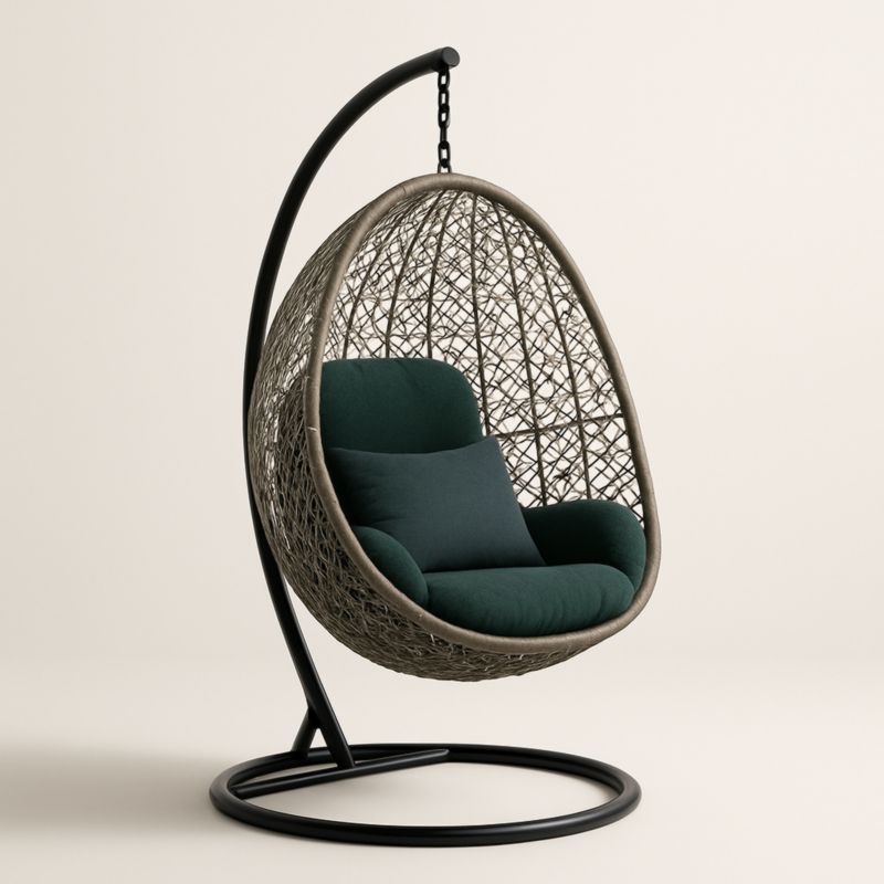 Fauteuil suspendu en rotin avec coussin vert