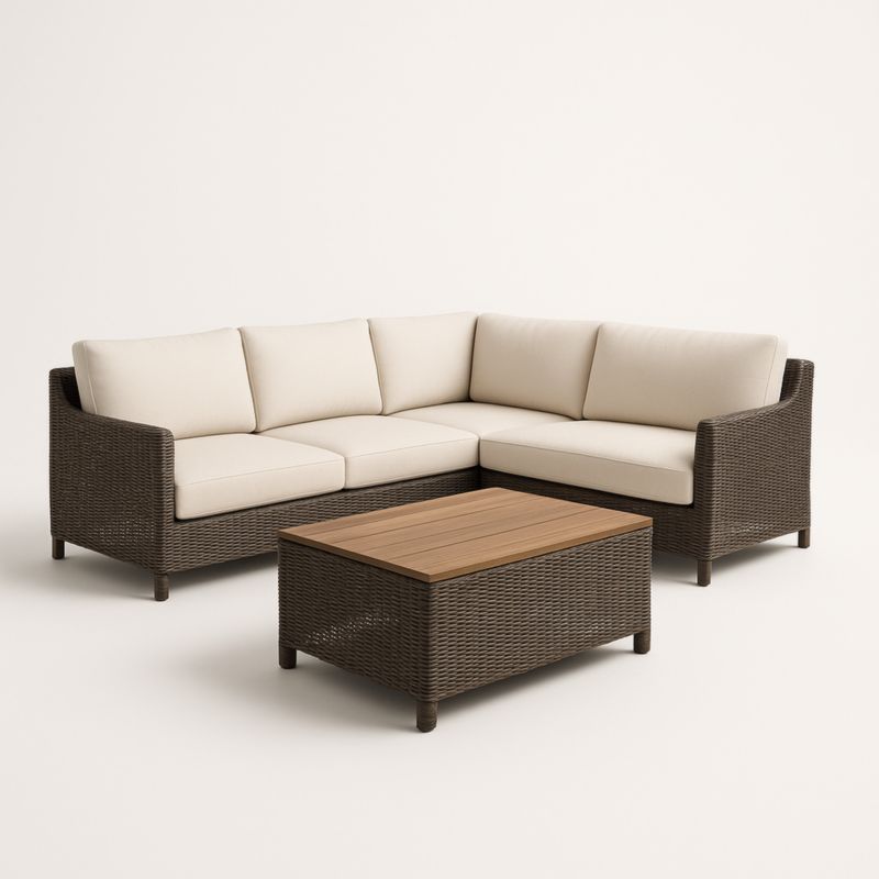 Canapé d'angle en rotin synthétique avec coussins en polyester beige et table basse en bois