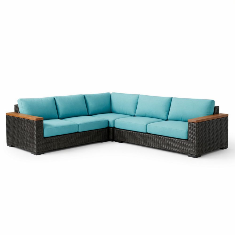 Divano ad angolo per esterni in rattan con cuscini blu