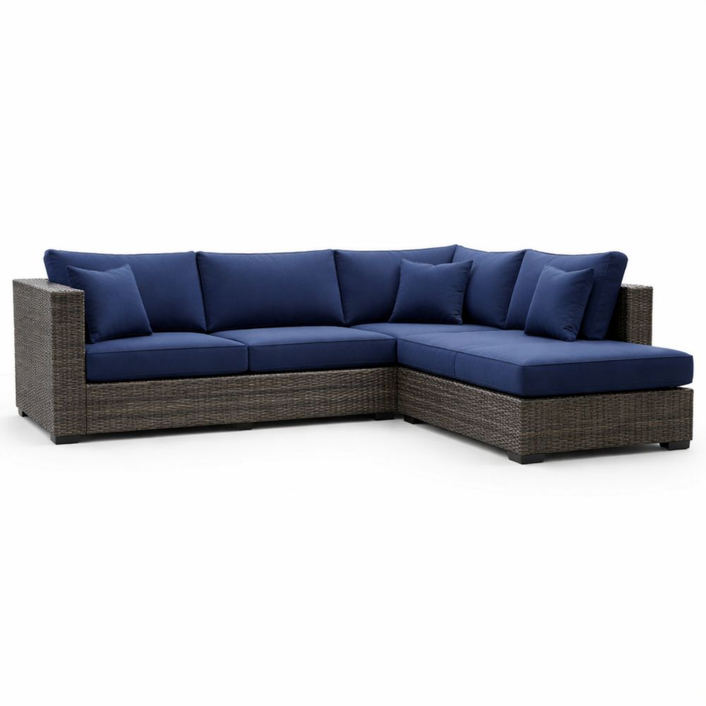 Divano angolare in rattan sintetico con cuscini blu