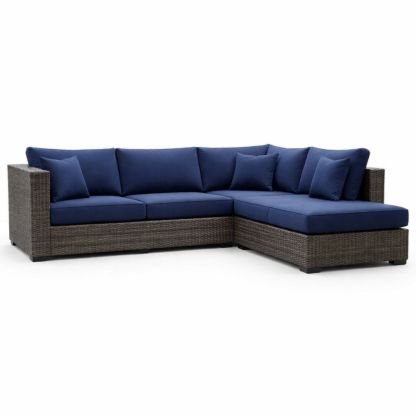 Divano angolare in rattan sintetico con cuscini blu